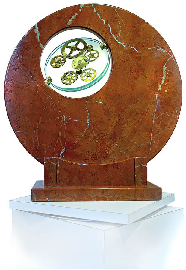 Sculpture Artist Andrea Davide created this kinetic gear art Sculpture Artist Andrea Davide created this kinetic gear art, stone sculpture,