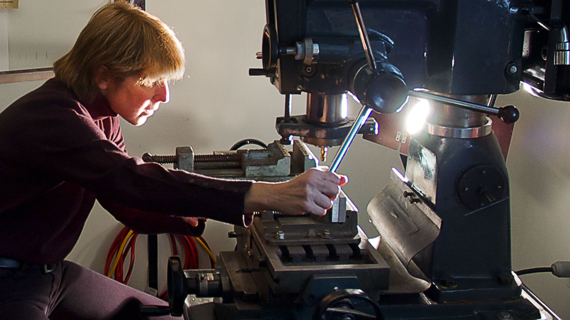 Sculpture Artist - Andrea Davide - Working in her machinery shop