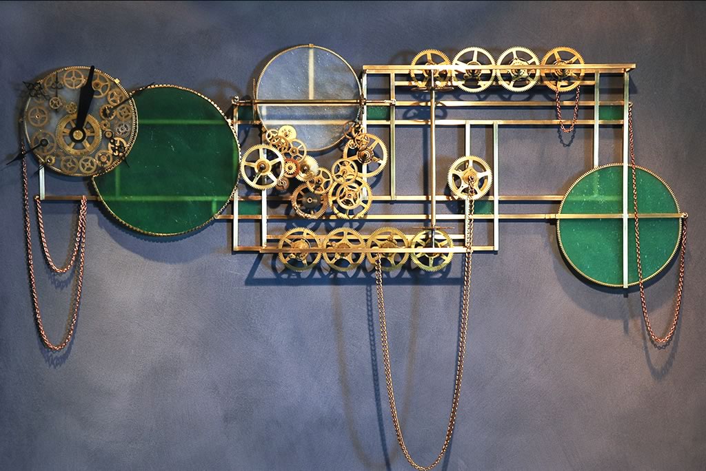 TimePiece 43”w x 38”hWall hanging sculpture made of metal and glass and gears